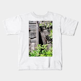 Old abandoned  shed doors being taken over by nature - Yorkshire, UK Kids T-Shirt